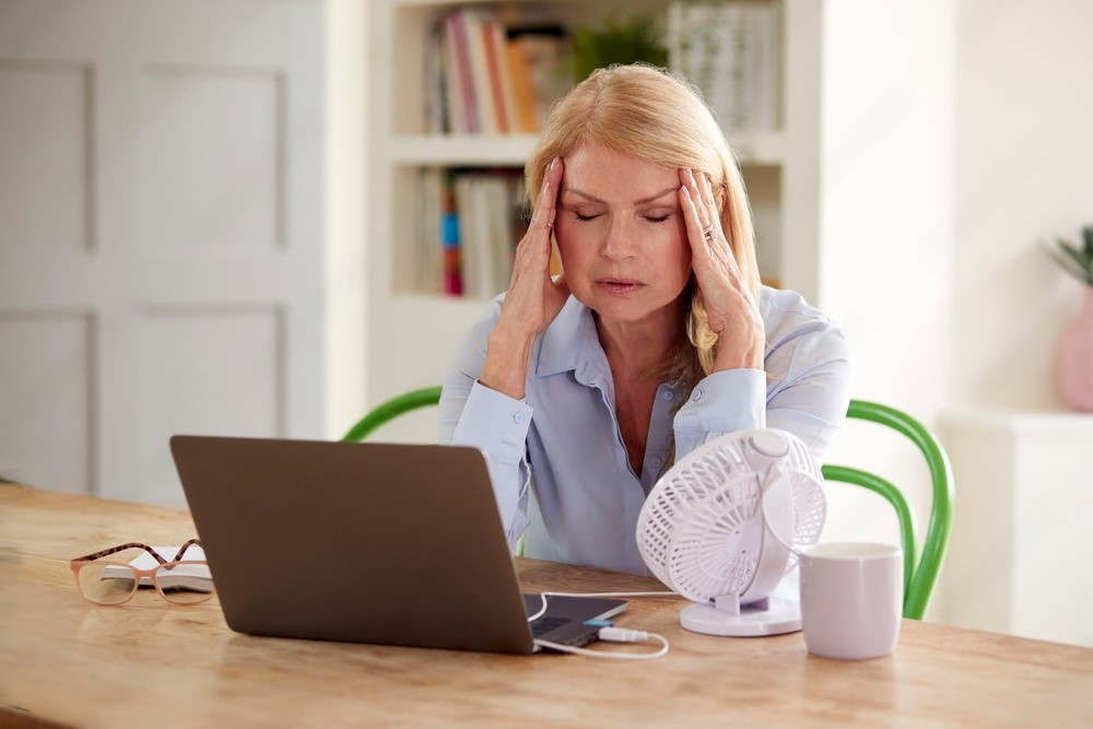 woman having hot flush