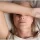 Closeup melancholic woman lying put hand on face feels unwell - Hormonal Changes Impact Intimacy
